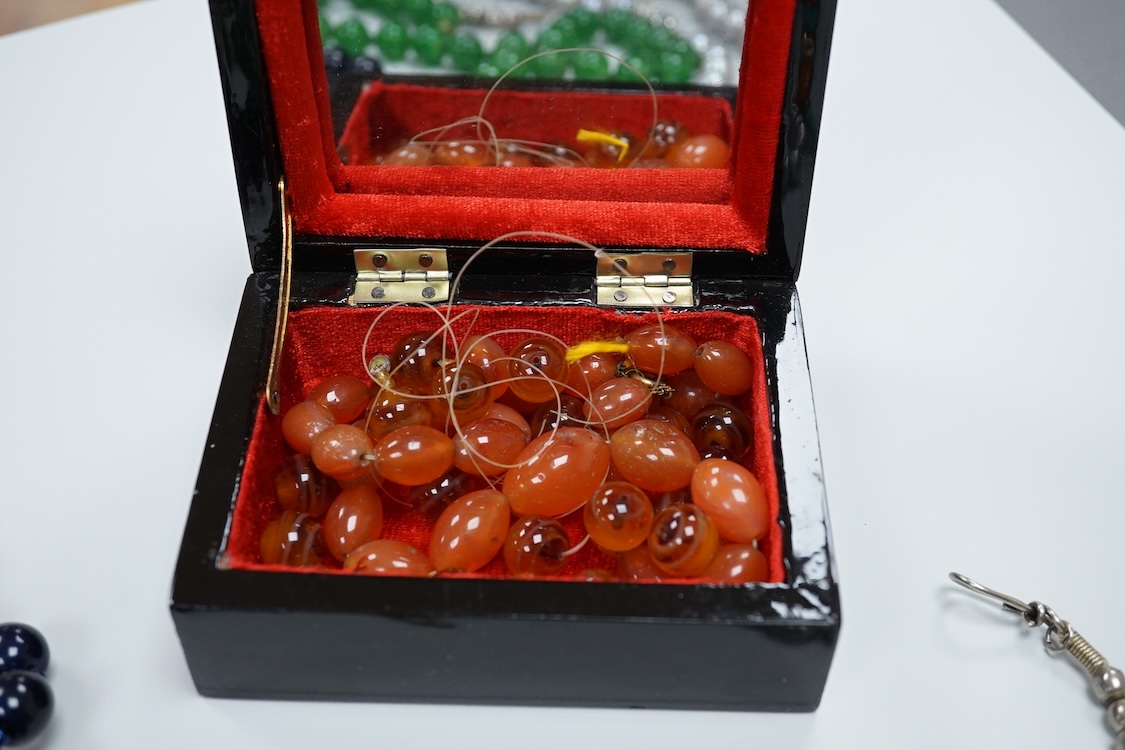 A quantity of glass and other beads.